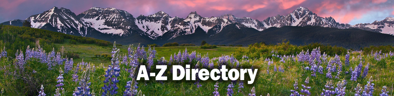 A to Z Directory header of Colorado mountains in the background in a meadow in the foreground